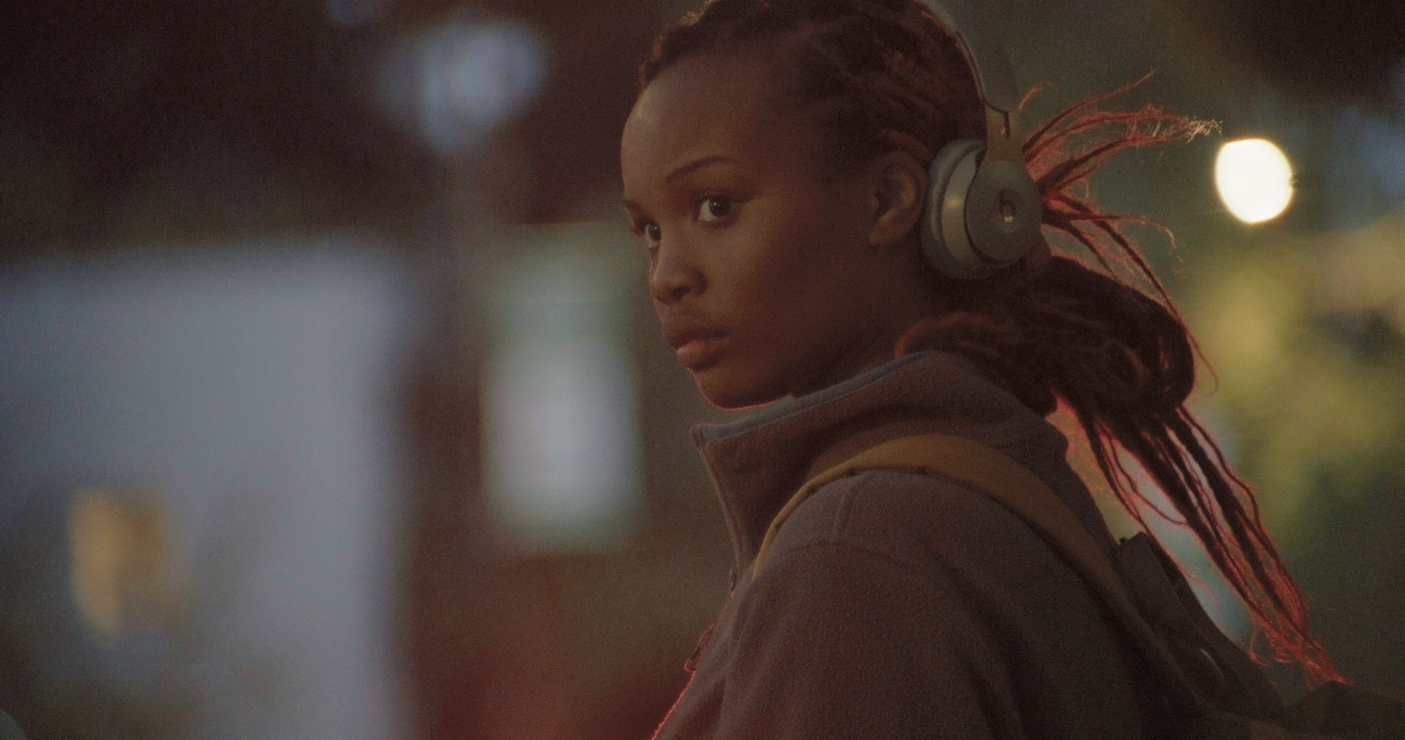 Lea walking home with headphones