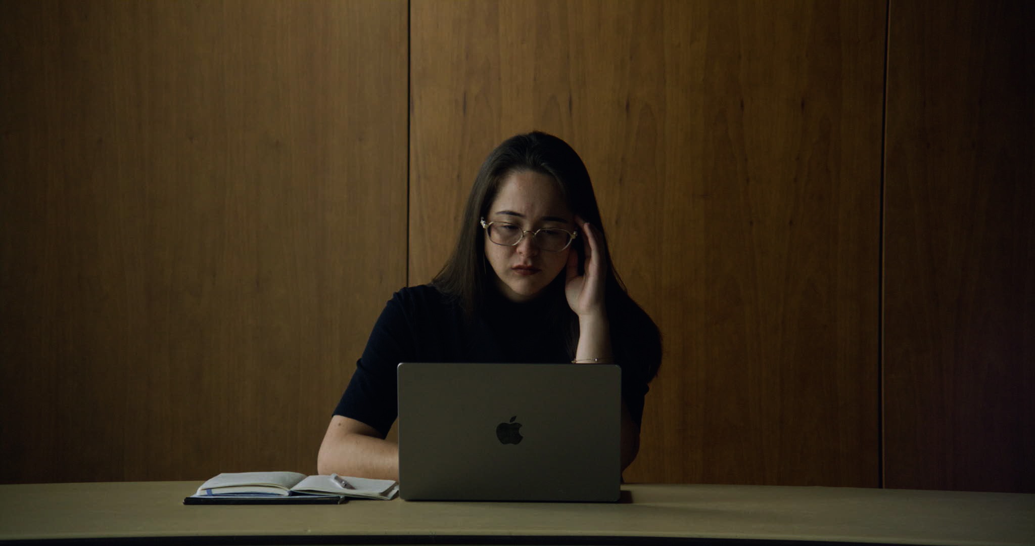 Sabrina working at a computer